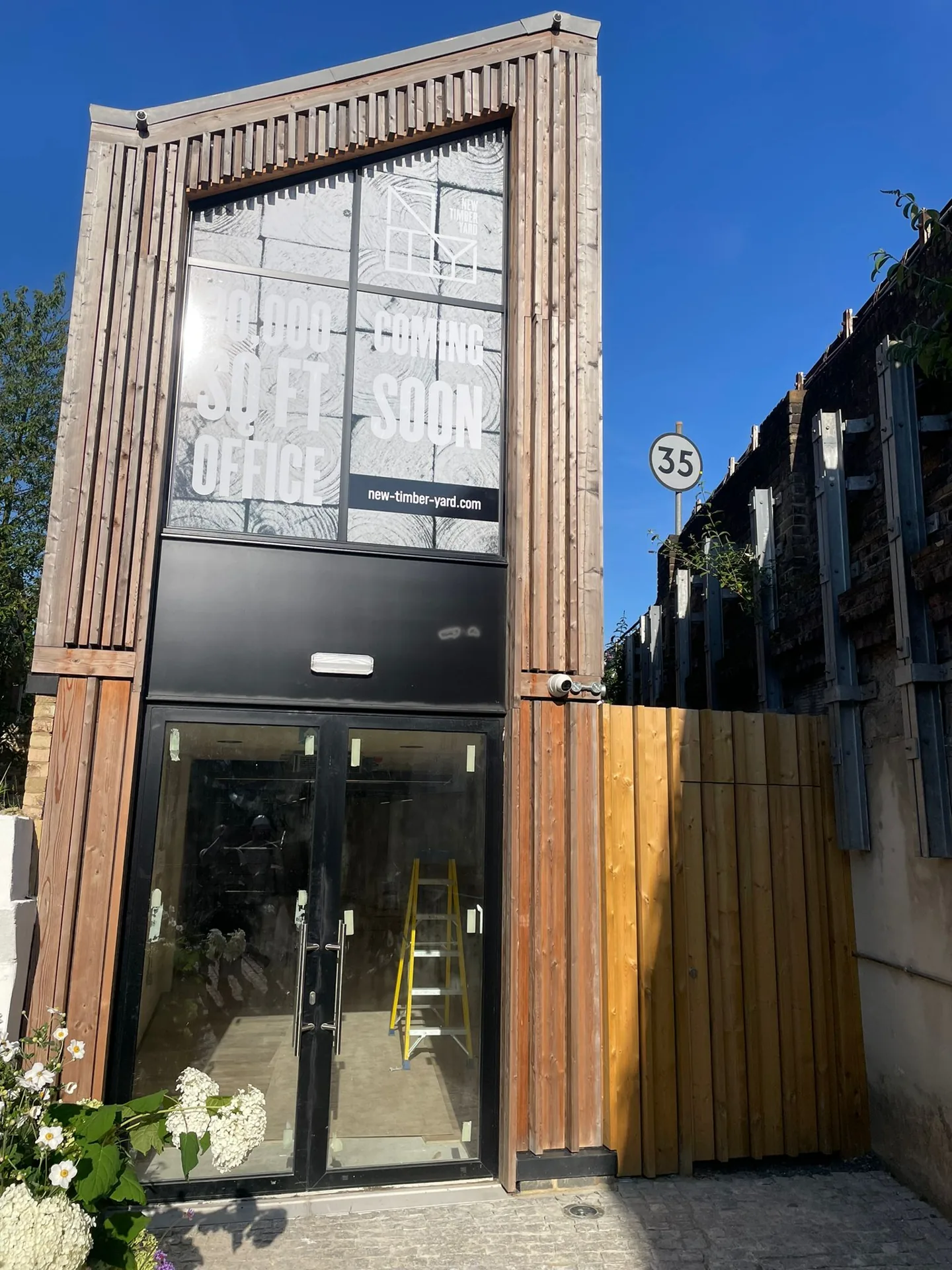 Timber-clad entrance to The New Timber Yard